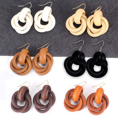 Orange round spiral wood earrings -ER229