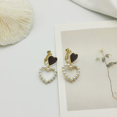 Pearl Hollow double heart ear clip -EC139