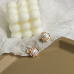 Baroque pearl ear clips in the shape of a heart -KI019