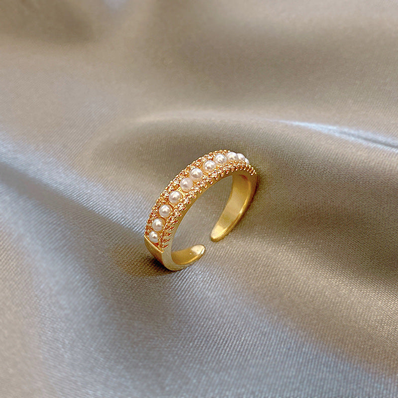 Adjustable ring with gold plated pearl opening -J116G