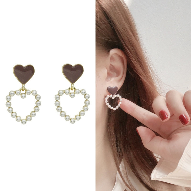 Pearl Hollow double heart ear clip -EC139