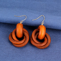 Orange round spiral wood earrings -ER229