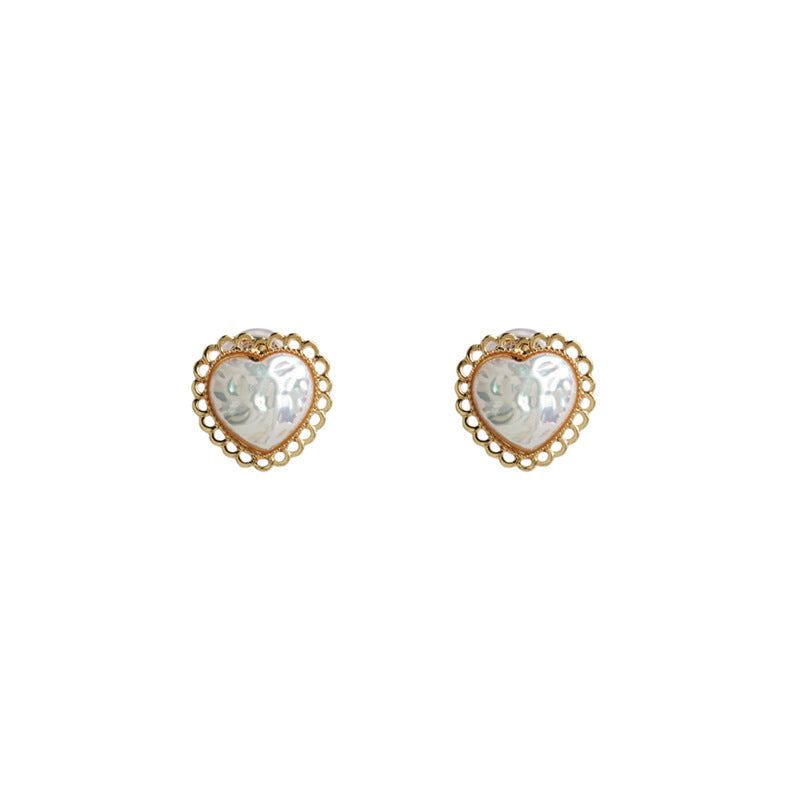 Baroque pearl ear clips in the shape of a heart -KI019